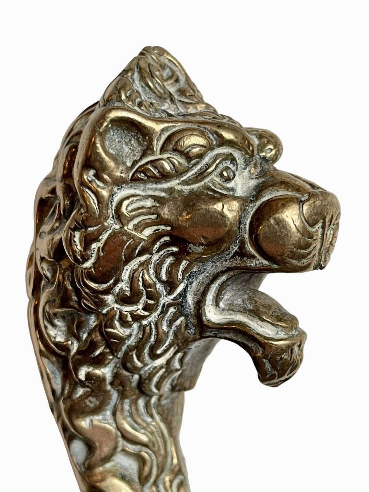 A Set Of Brass Lion Head Fire Irons photo for sale