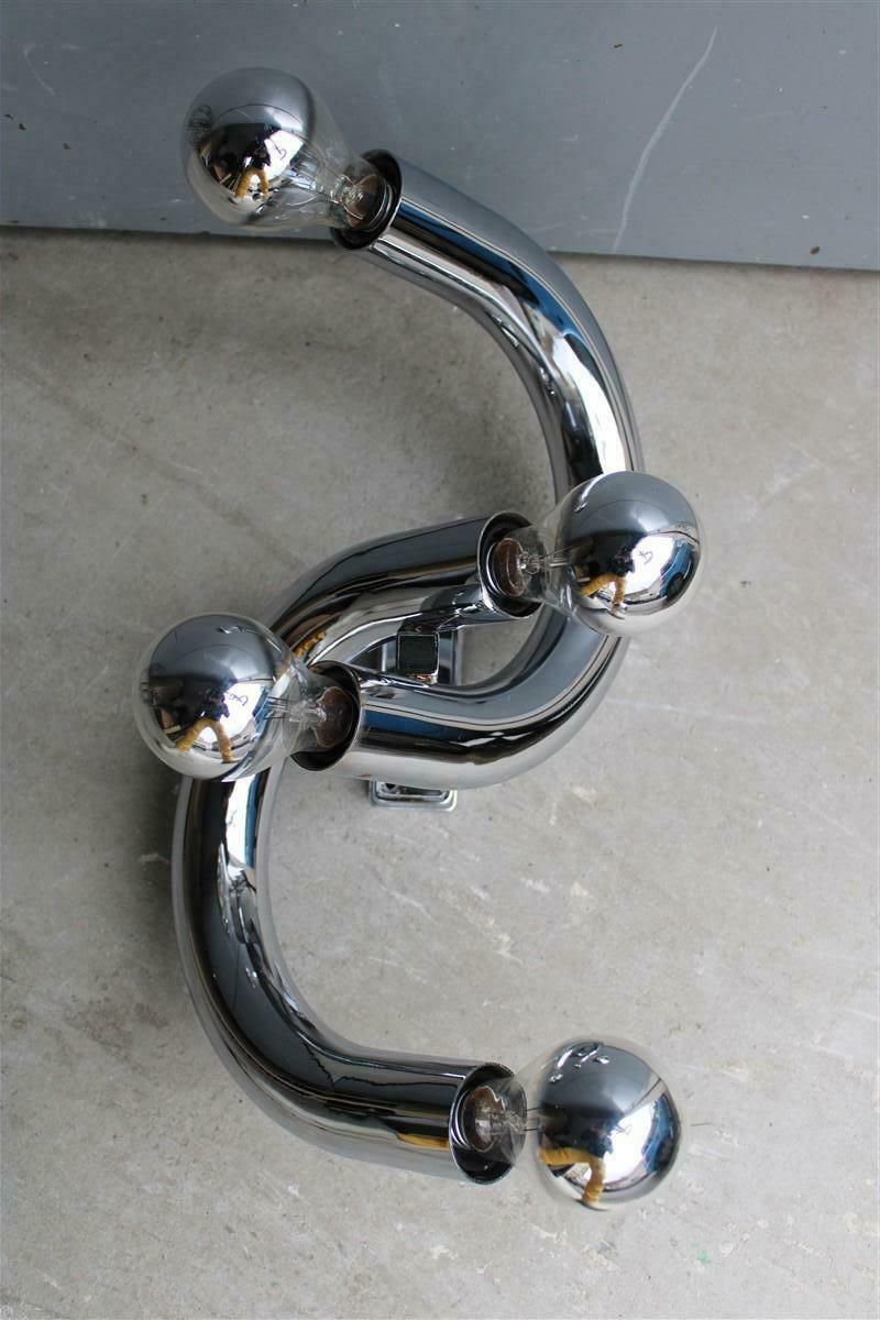 photo furniture Minimalist Sculptural Stilux Tubular Steel Wall Lamp 1970s Silver Curved