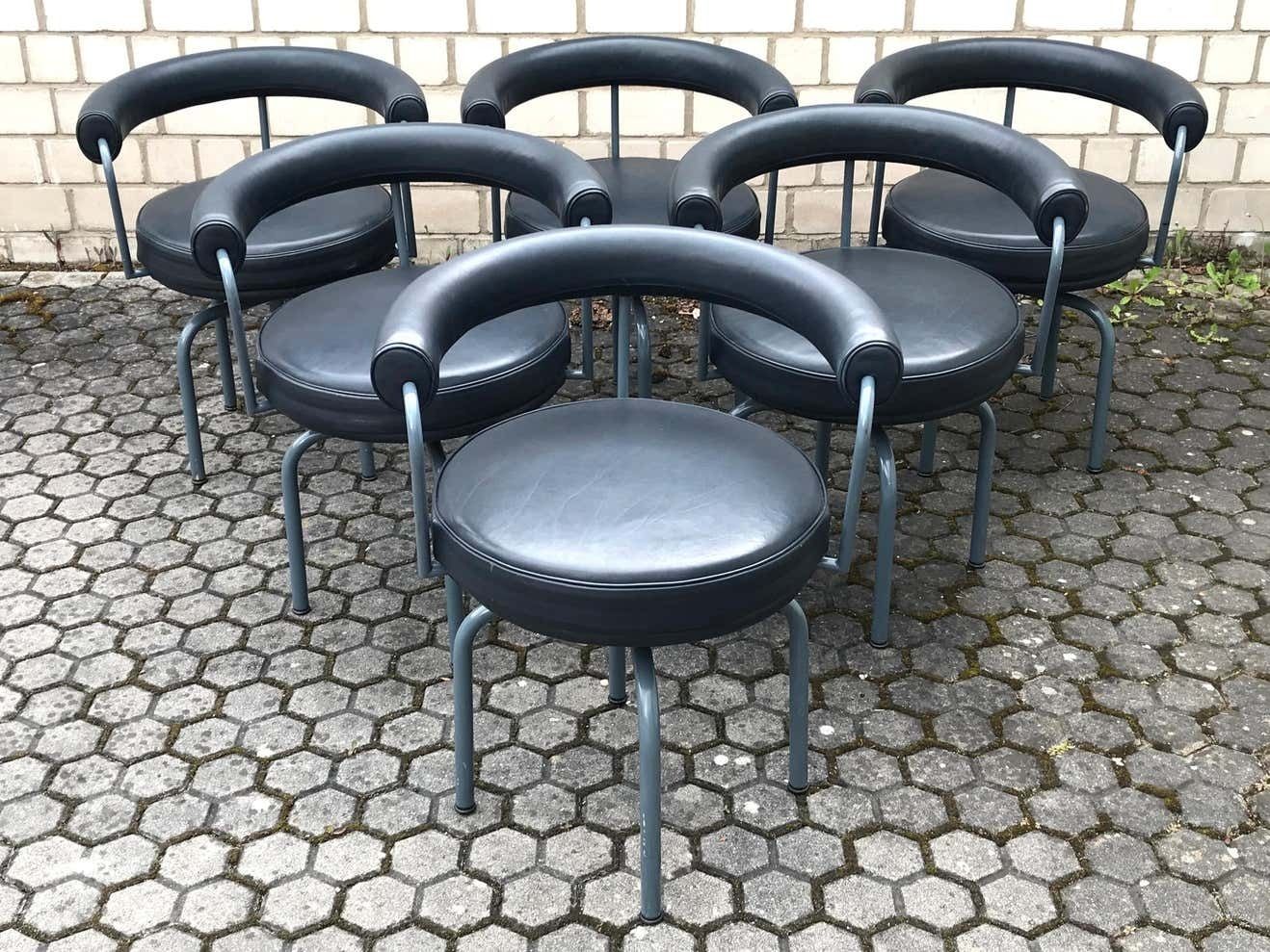 Set Of Six Cassina Swivel Arm Chairs Lc7 By Le Corbusier, Perriand & Jeanneret photo for sale