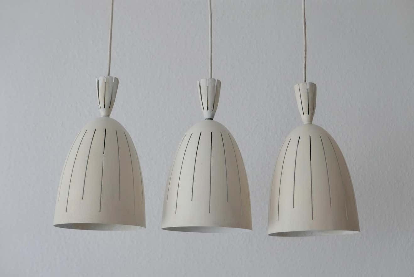 Set Of Three Lovely Mid Century Modern Diabolo Pendant Lamps, 1950s, Germany photo furniture