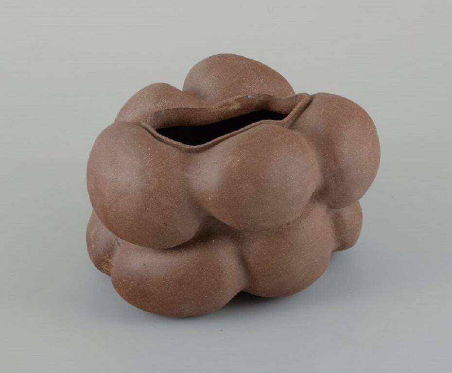 Christina Muff, Danish Contemporary Ceramicist. Dark Brown Unglazed Vessel. photo furniture