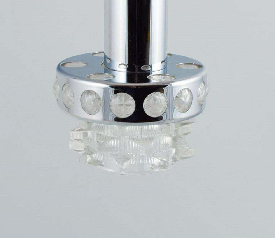 Raak, The Netherlands. Designer Lamp In Chrome, Plastic And Clear Glass. photo furniture