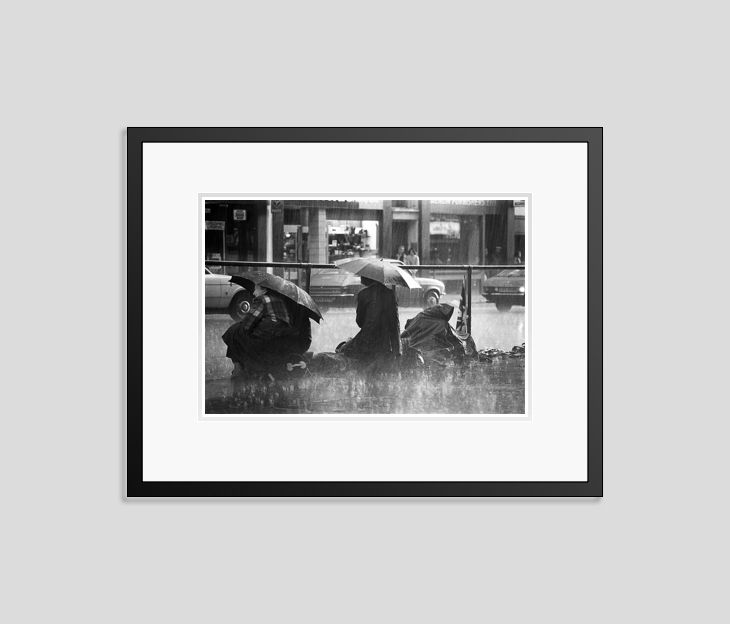 'Don’t Rain On My Parade' Homer Sykes Framed In Black