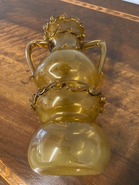 photo furniture Antique Murano Glass Vase From The Late 1800s In Amber Color With Relief Work.