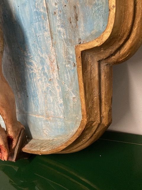 Ancient Plaster Sculpture Of Christ Crucified From The 17th Century. photo furniture