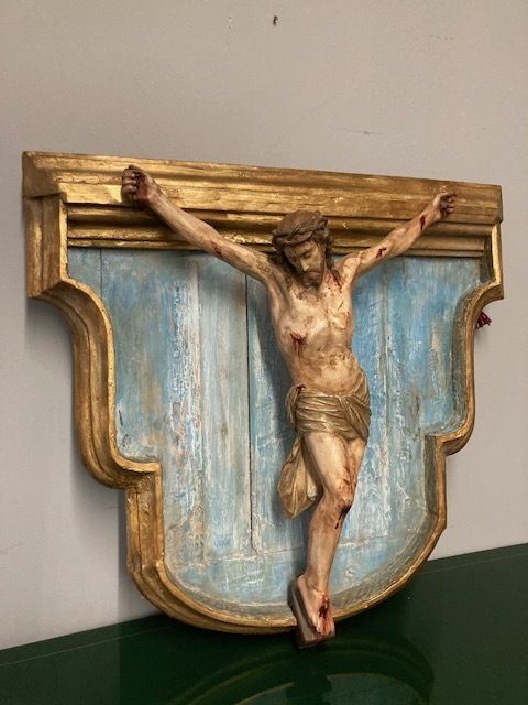 Ancient Plaster Sculpture Of Christ Crucified From The 17th Century. photo 936.0