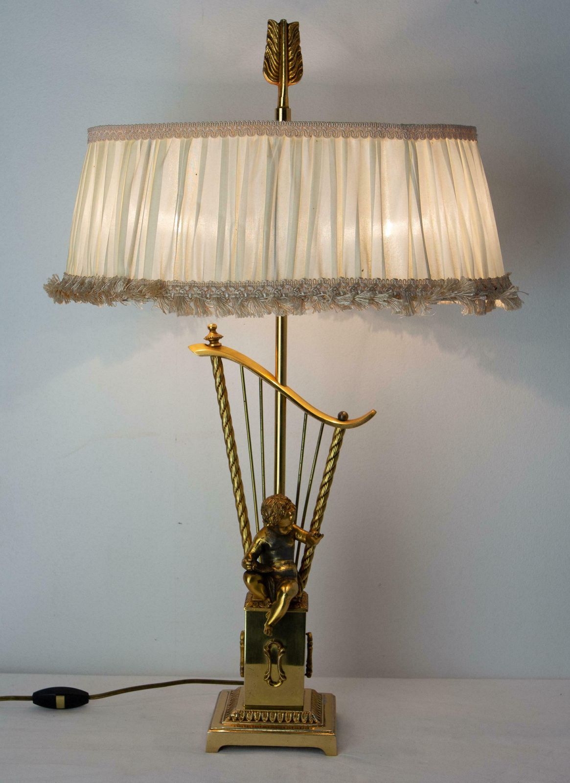 French Brass Table Lamp With Putti Reading In Front Of A Harp, Mid Century photo for sale