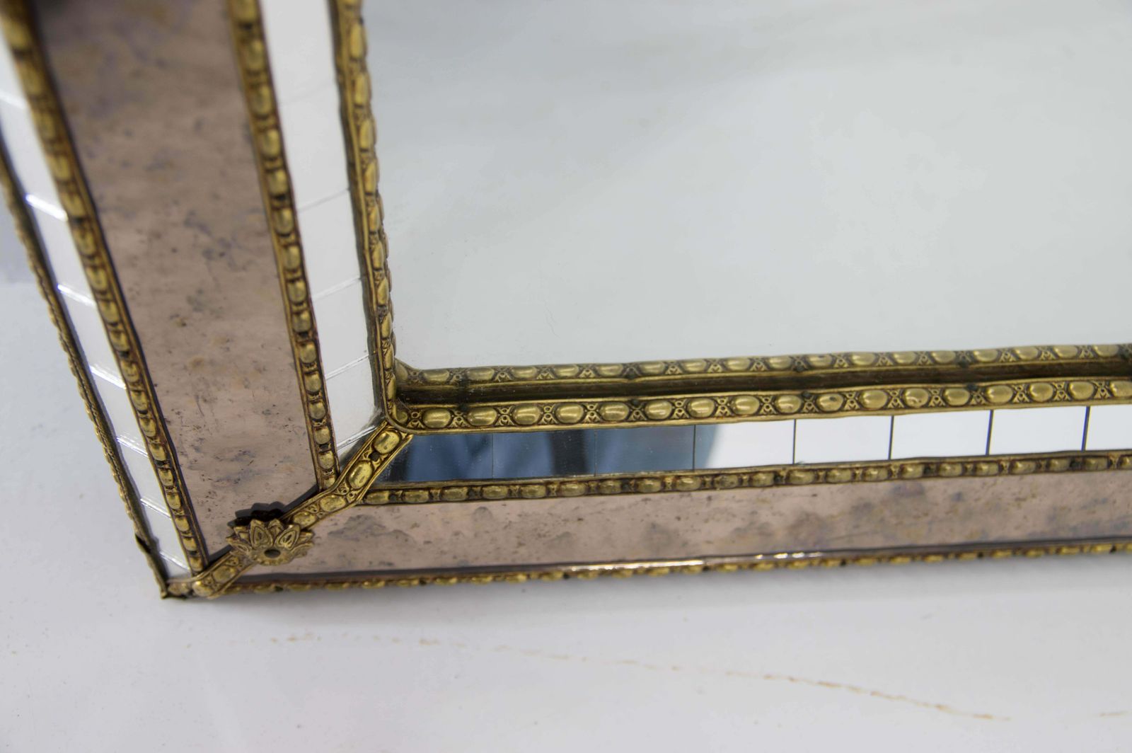 photo furniture Multi Facets Mirror With Brass Garlands France 1970s