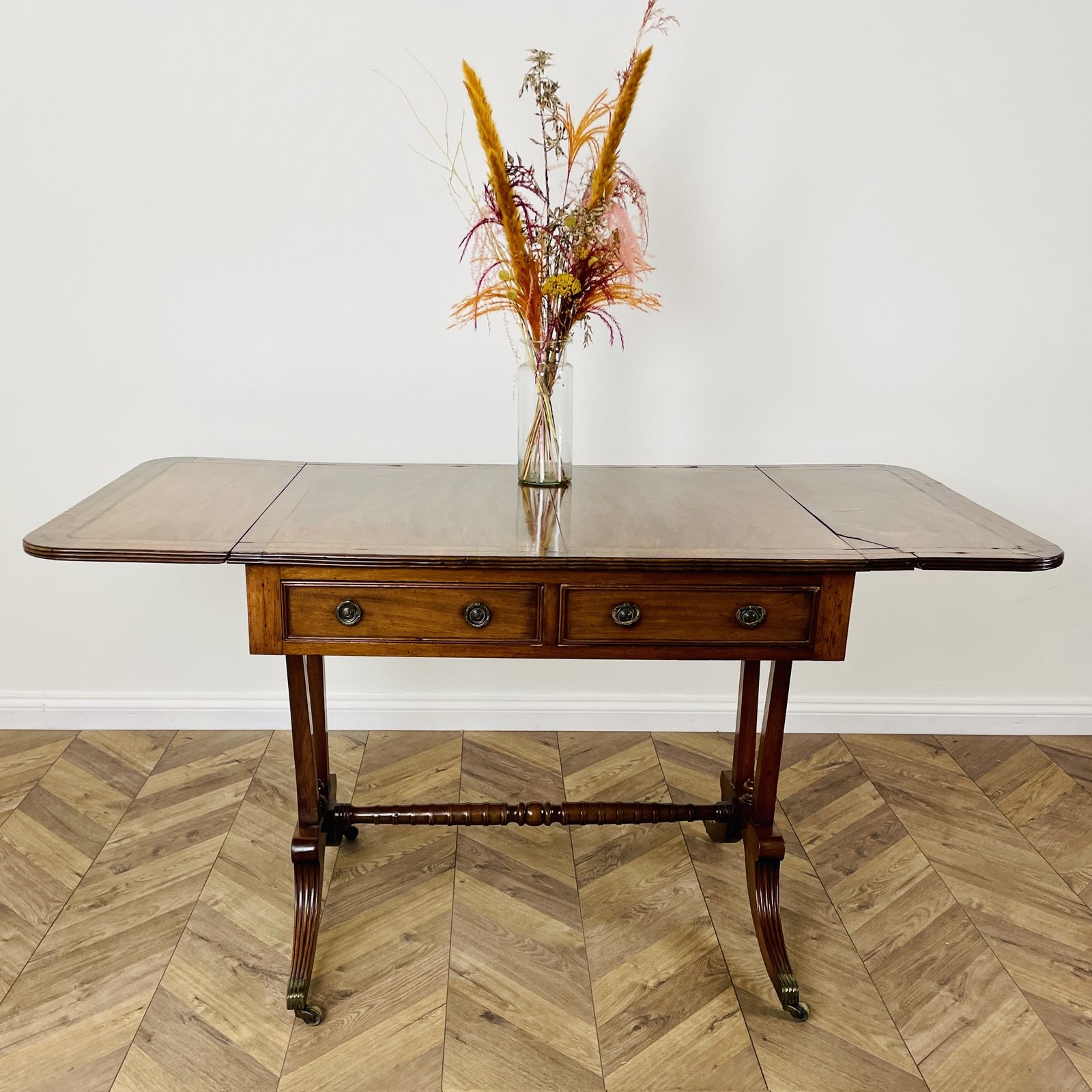 Furniture Antique English Mahogany Drop Leaf Stretcher Table On Castors, 19th Century photo