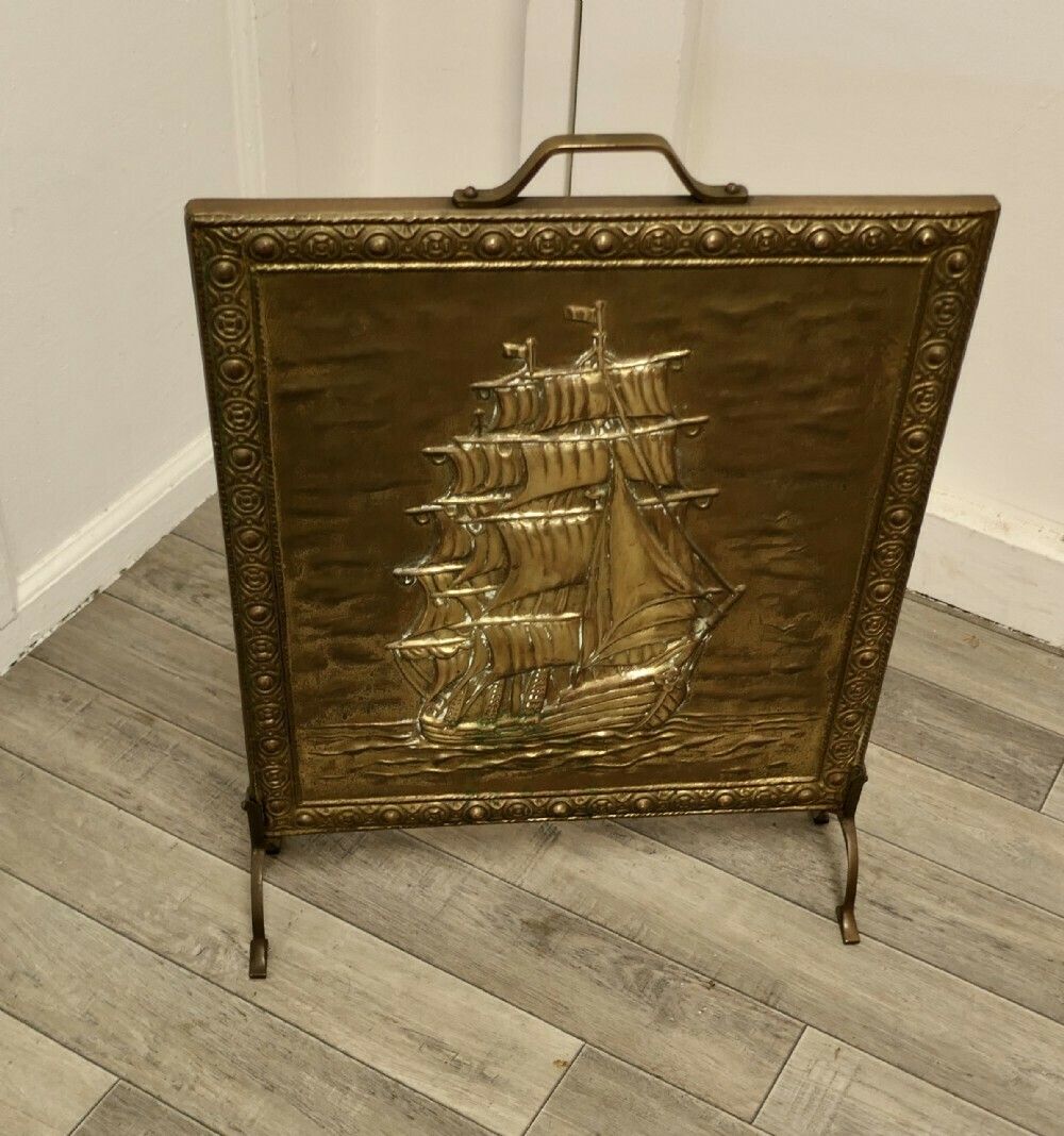 A Large Brass Fire Screen With The Cutty Sark photo furniture