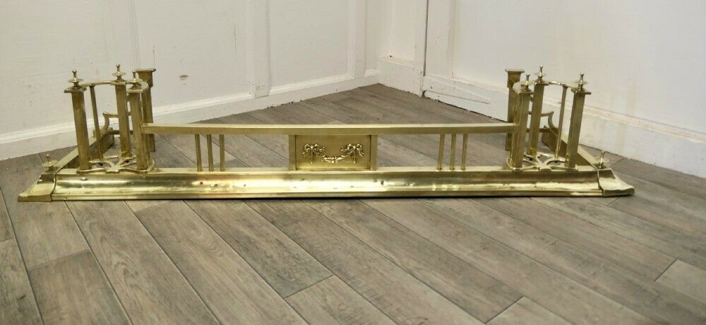 An Art Nouveau Victorian Brass Fender