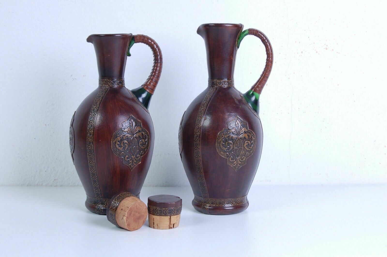 Set Of Green Blown Glass Jugs And Glasses Covered In Vintage Brown Leather photo Home Decor
