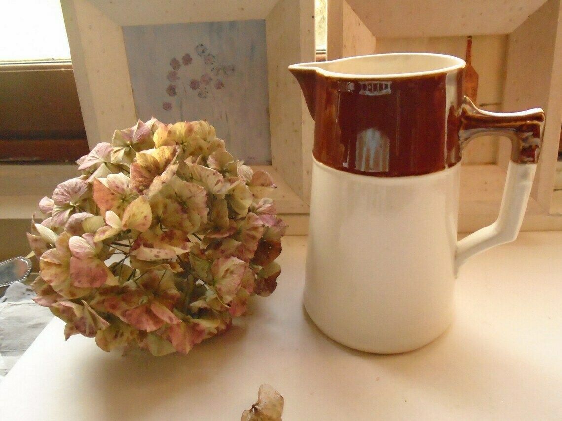 photo for sale Antique French Tall Cream And Brown Ceramic Pitcher, Water Jug, Flower Vase, Ironstone Pitcher
