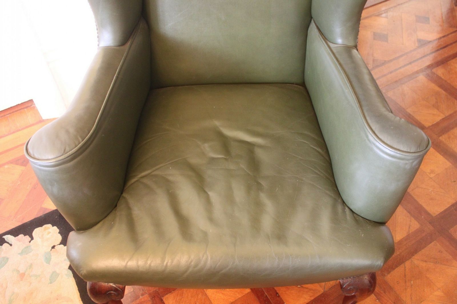 Late 19th/Early 20th Century Queen Anne Style Wing Chair In Green Hide photo furniture