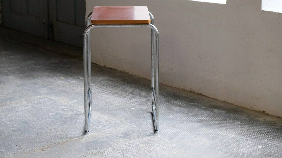 Small Tubular Steel Side Table In Bauhaus Design With Bakelite Shelf photo furniture