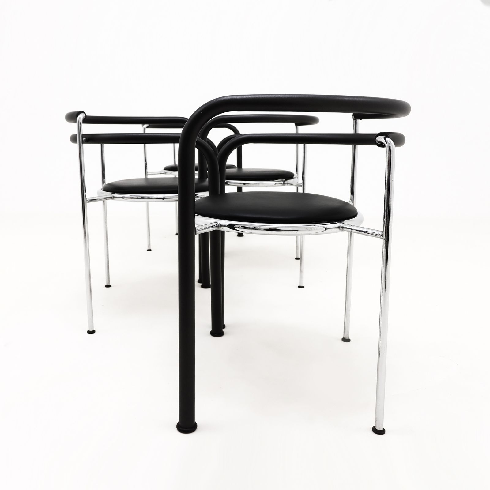 A Set Of 4 Rud Thygesen And Johnny Sorensen Dark Horse Chairs In Chrome And Black Leather photo 3450.0