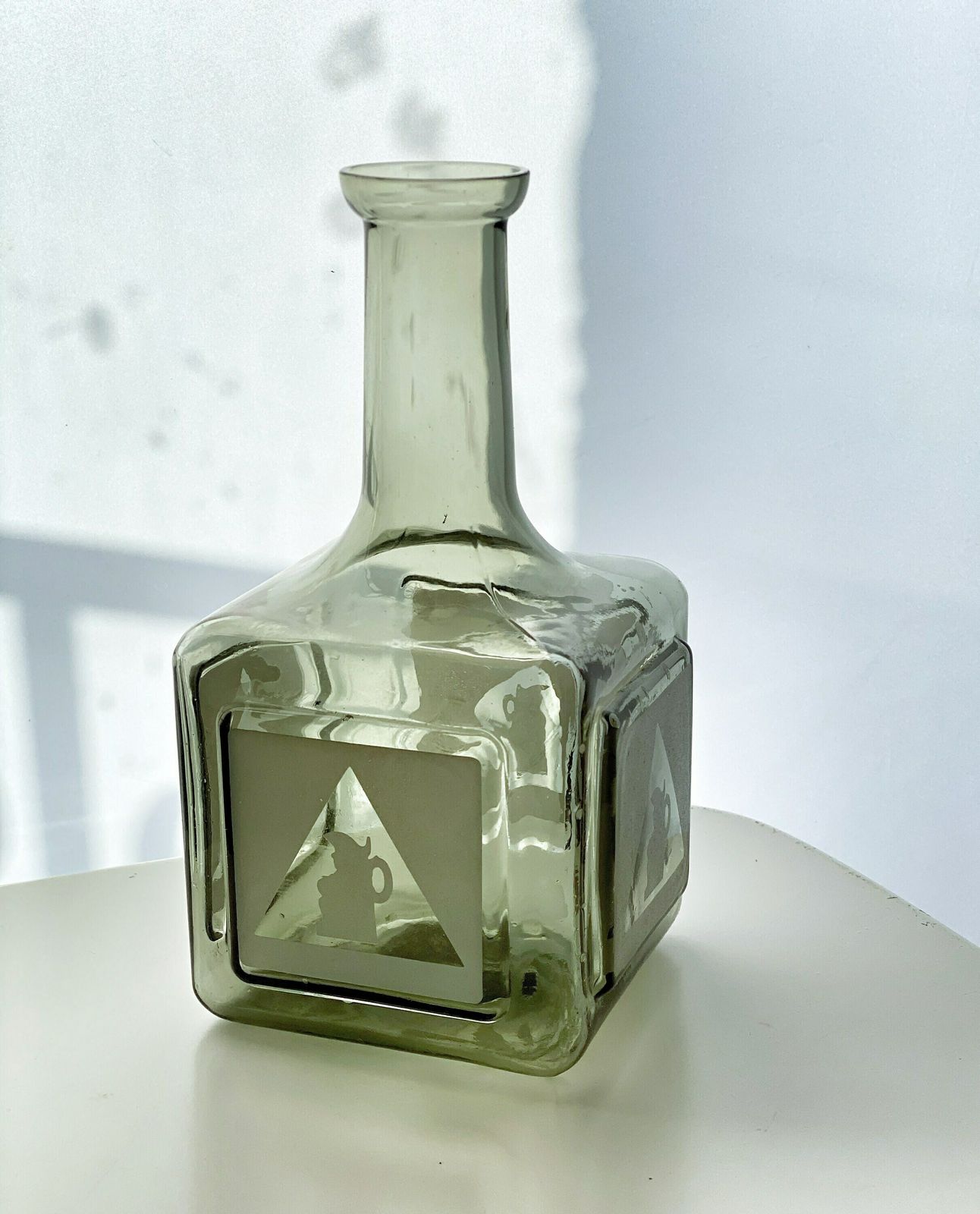 1970s | Bass Charrington | Smoked Glass Bottle | Frosted Toby Jug Logo photo furniture