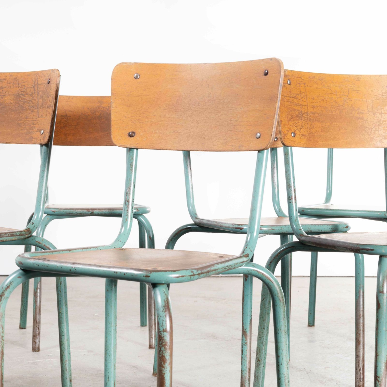 1950’s French Mullca Framed Seat Stacking Dining Chairs – Set Of Eight photo vinterior
