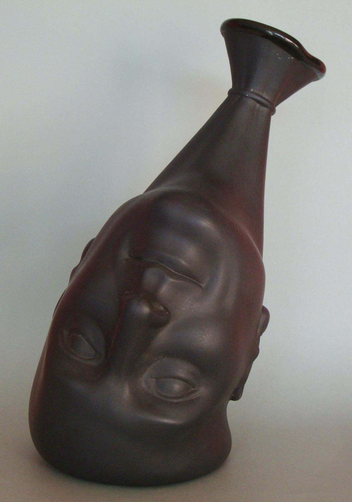 Ilona Romule Vase. A Man's Head (Black) Porcelain