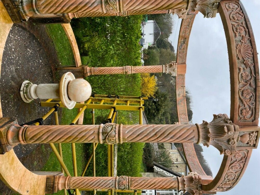 photo vinterior A Wonderful Natural Pink Marble Gazebo With Seats