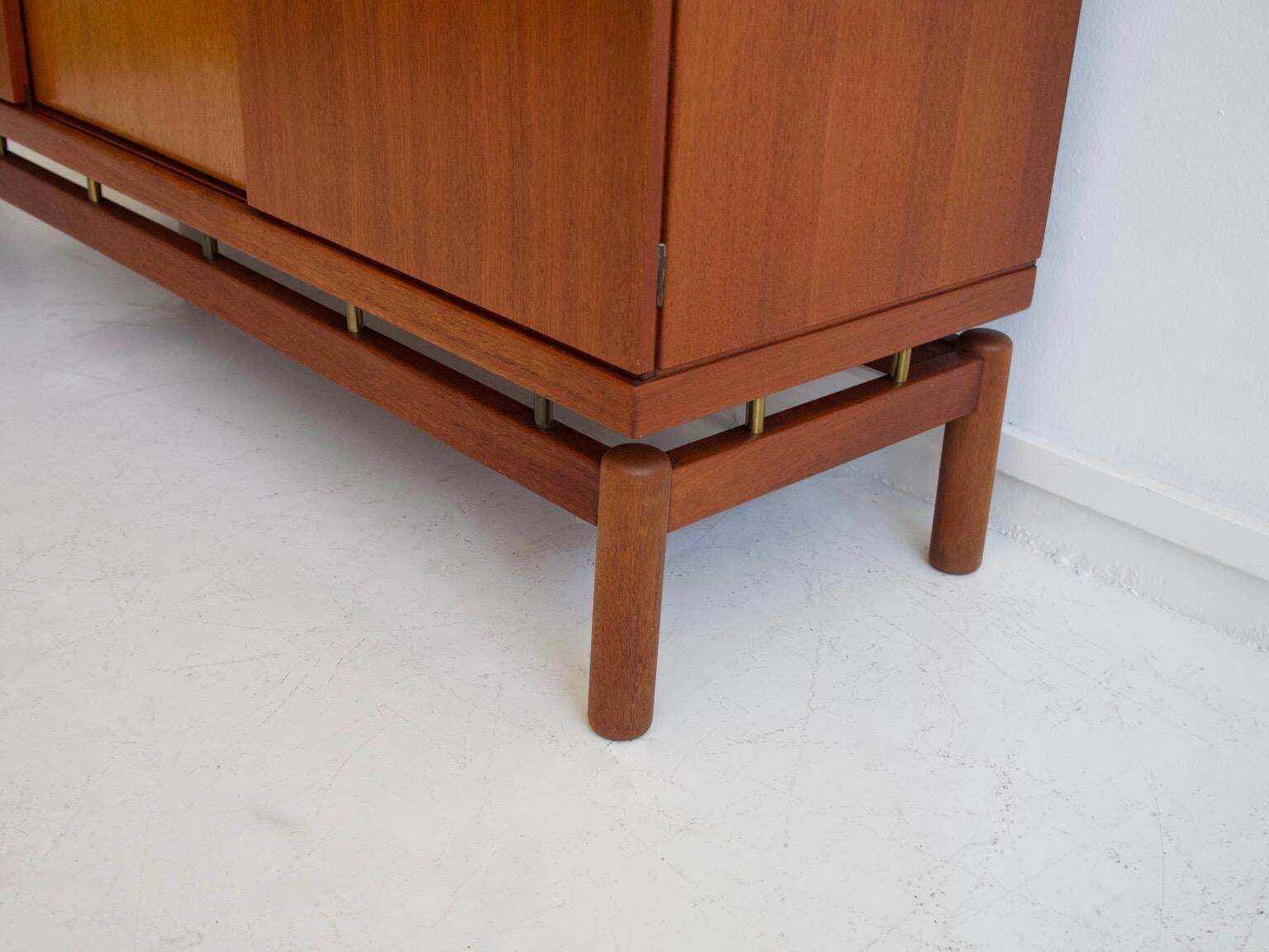 photo furniture Mid 20th Century Modern Teak Sideboard With Brass Details