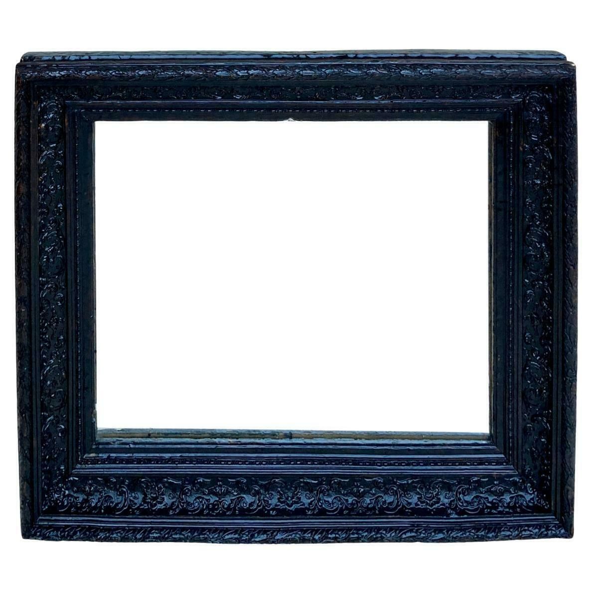 Miroir mural français en bois sculpté à cadre sombre, 1920