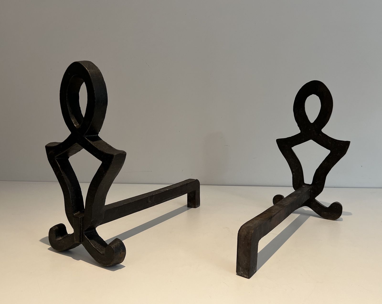 Pair Of Modernized Cast Iron And Wrought Iron Andirons By Raymond Subes photo for sale