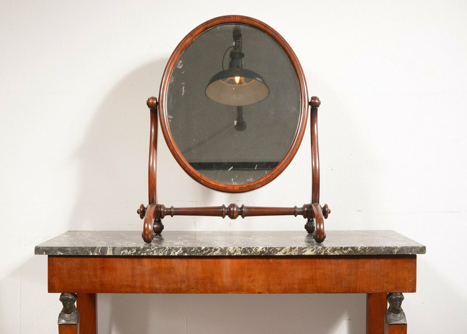 A William IV Mahogany Oval Swing Toilet Mirror With Foxed Mercury Plate   C.1835