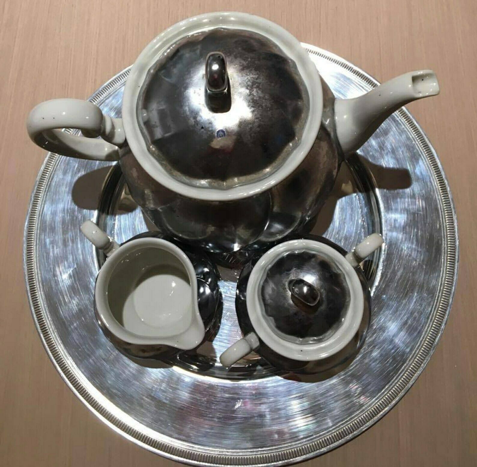 Tea Set Or Coffee Set Of 3 Pieces, Teapot, Sugar Bowl And Creamer, Milk Pot Of The Iconic Belgian House Demeyere. Vintage Belgium 1970s photo for sale
