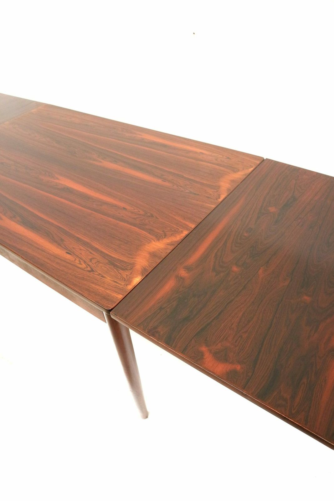 Vintage Extendable Rosewood Dining Table Made In The 60s photo for sale