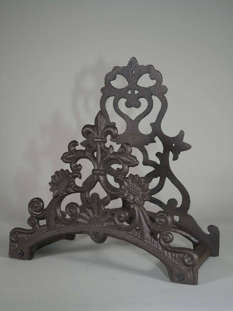 Garden Hose Holder Wall Mounted Lily Cast Iron Wall Mounted Antique Style Hose Holder photo for sale