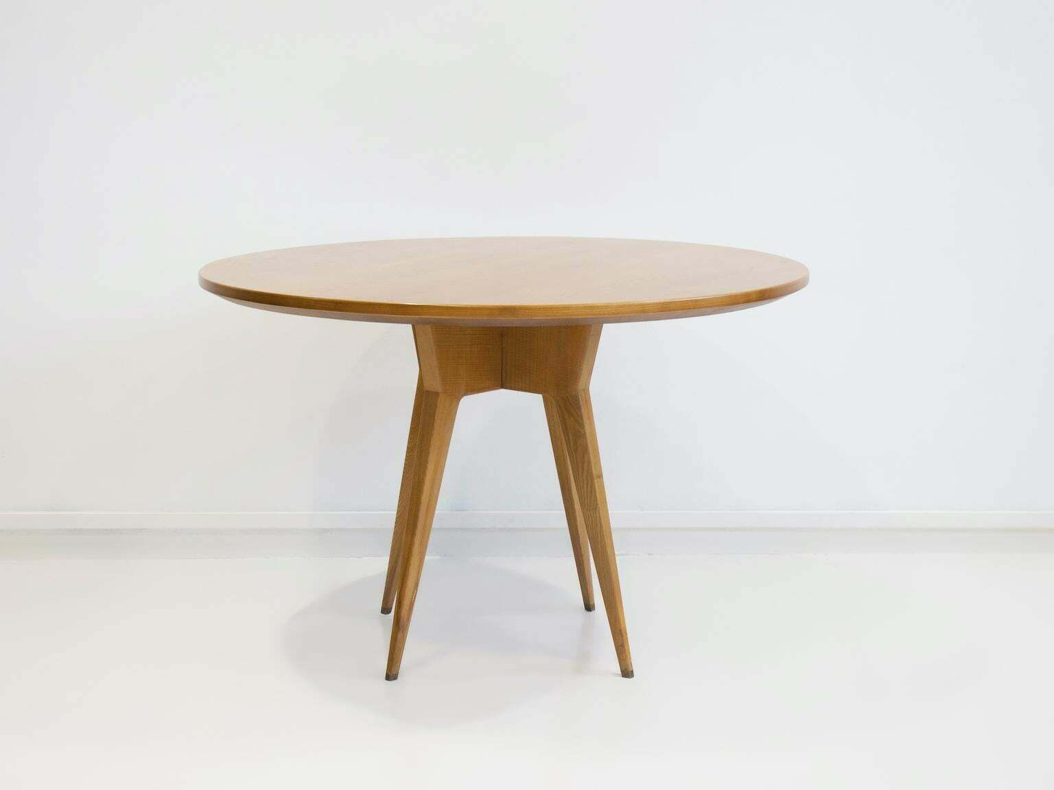 Round Dining Table Of Ash Wood With Brass Details photo furniture