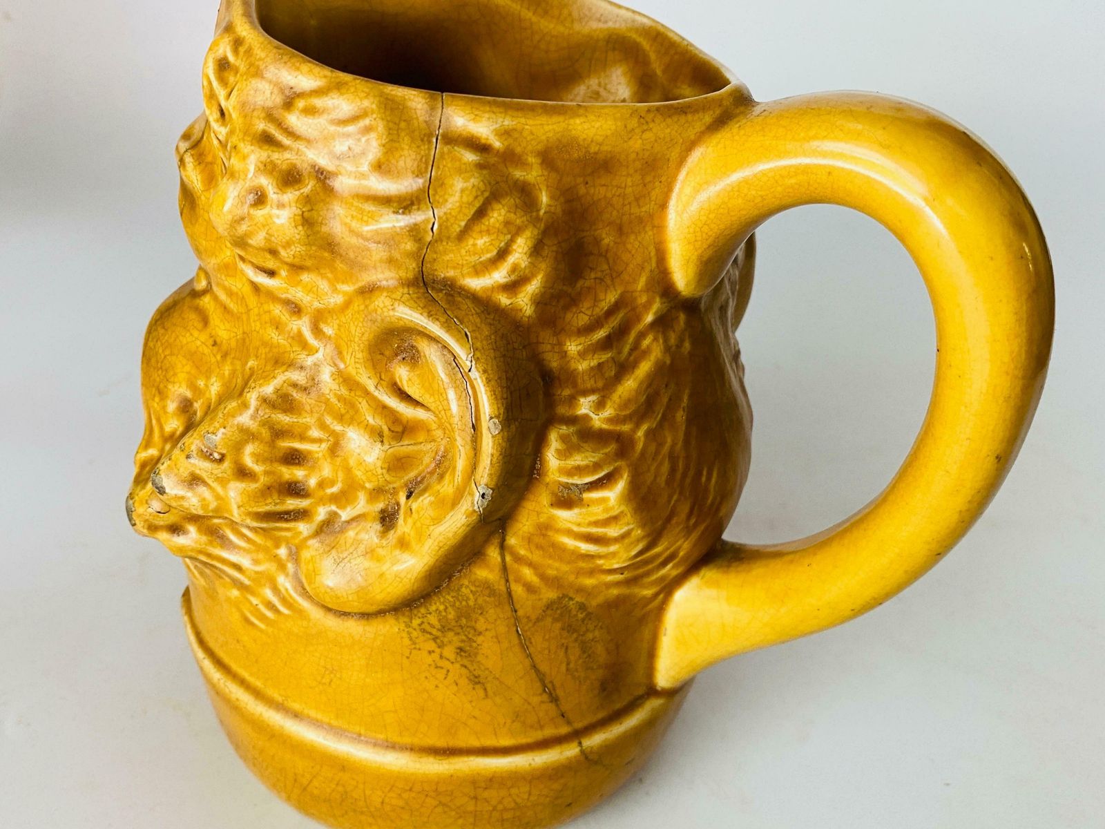 263.0 Pitcher In Ceramic From France Yellow Colour Shape Man Face France 1970 photo
