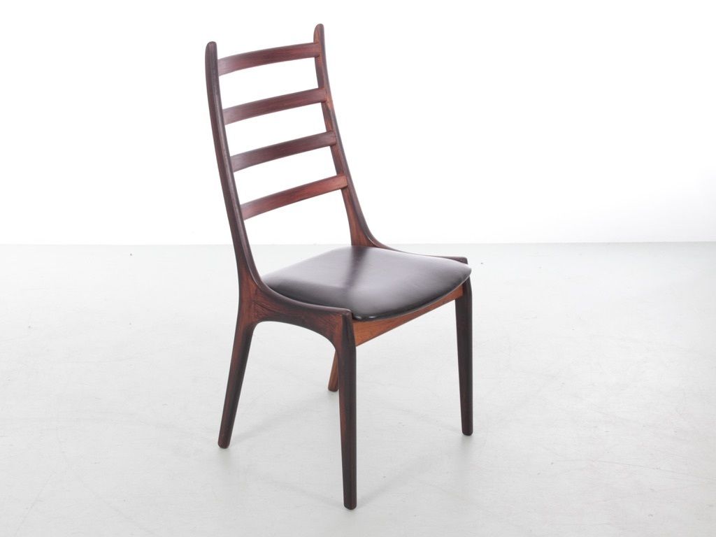 3900.0 Mid Century Modern Scandinavian Set Of 4 Rosewood Chairs By Henning Kjærnulf. photo