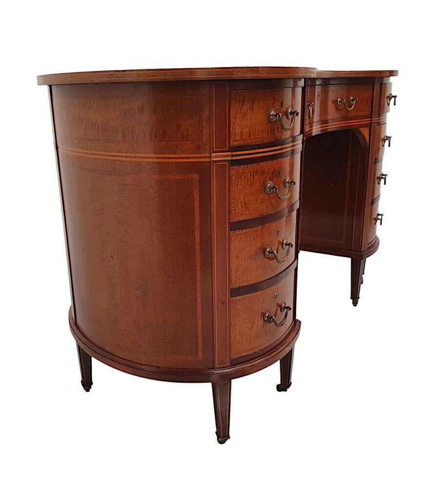 A Very Fine Edwardian Leather Top Kidney Shaped Desk photo furniture