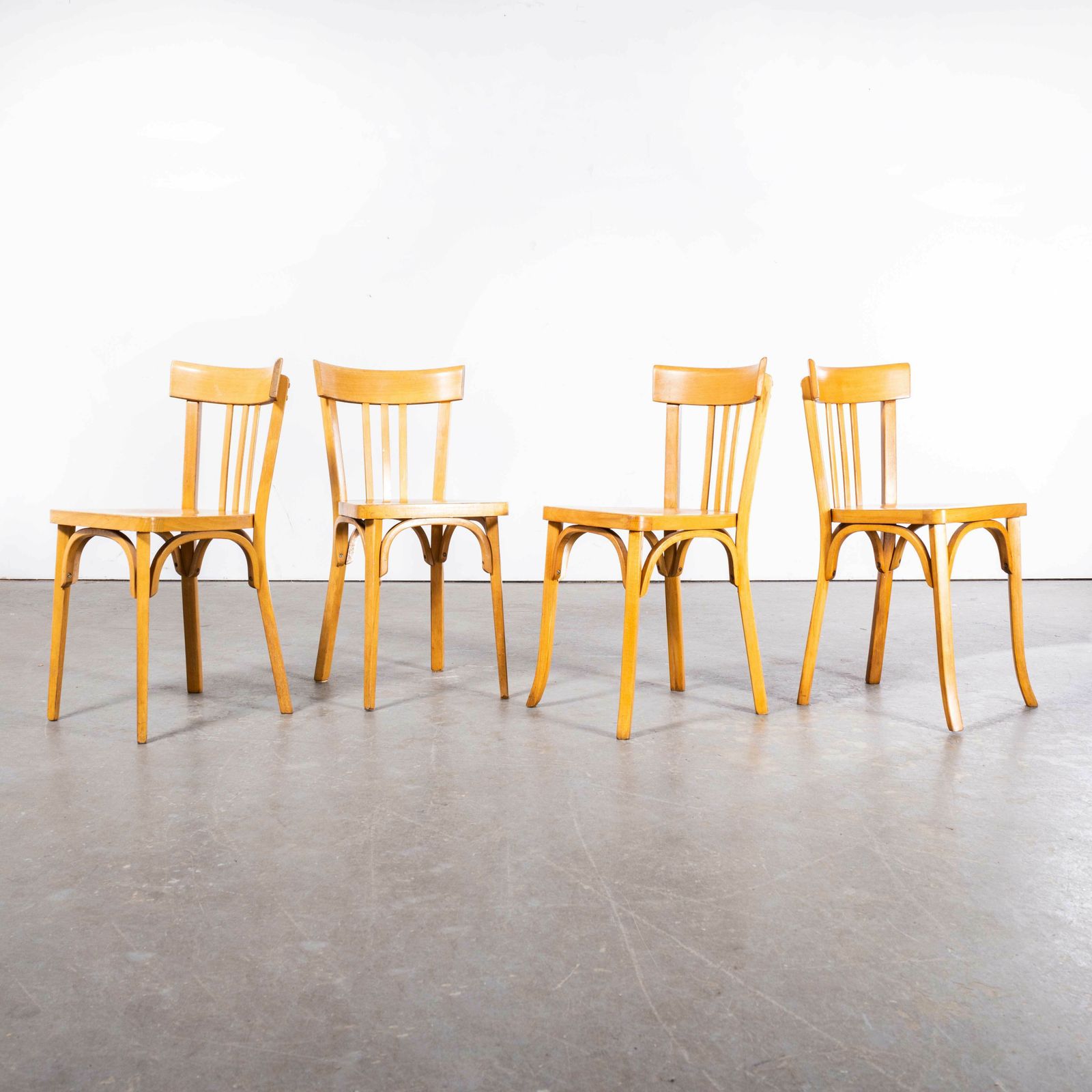 1950’s French Baumann Blonde Beech Tri Back Bentwood Dining Chairs – Set Of Four