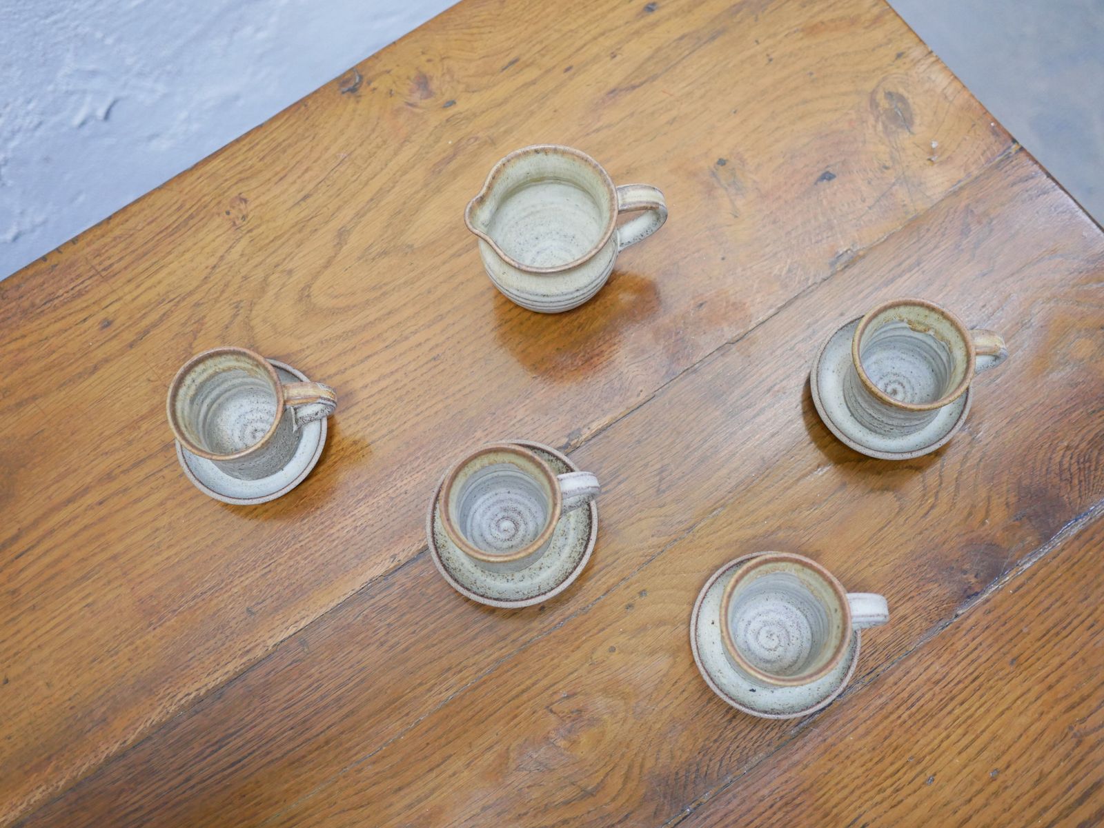 photo furniture Series Of 4 Cups And A Vintage Sandstone Milk Jug