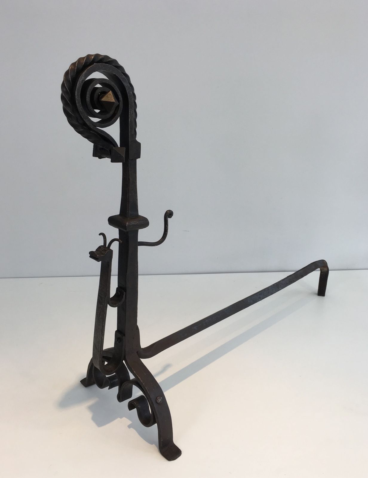 Pair Of Important Wrought Iron Andirons Representing A Snail photo vinterior