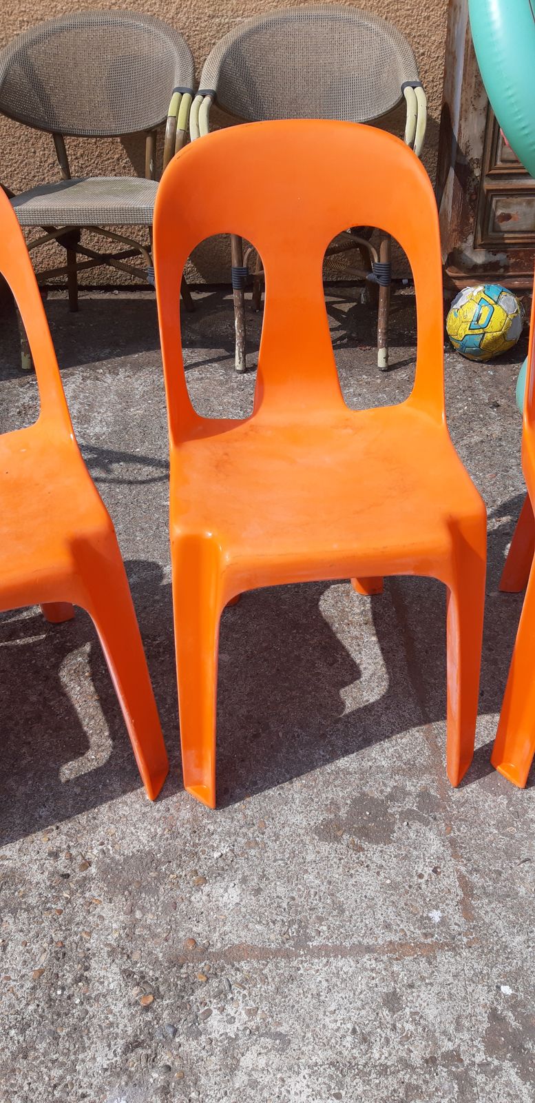 12 Stackable Orange Plastic Chairs photo buy