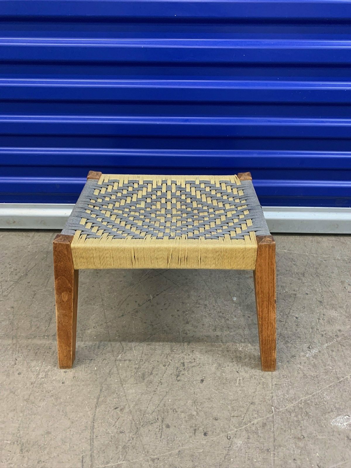 Cute Little Footstool With Woven Rope Seat And Slanted Legs photo for sale