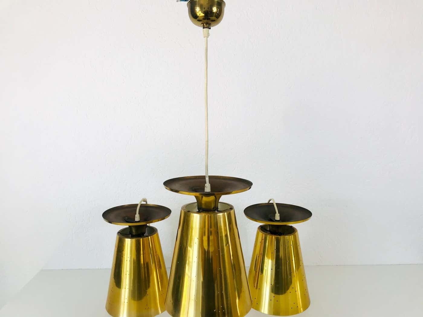 Lighting Set Of 3 Polished Brass Pendant Lamps Attributed To Paavo Tynell, 1950s photo