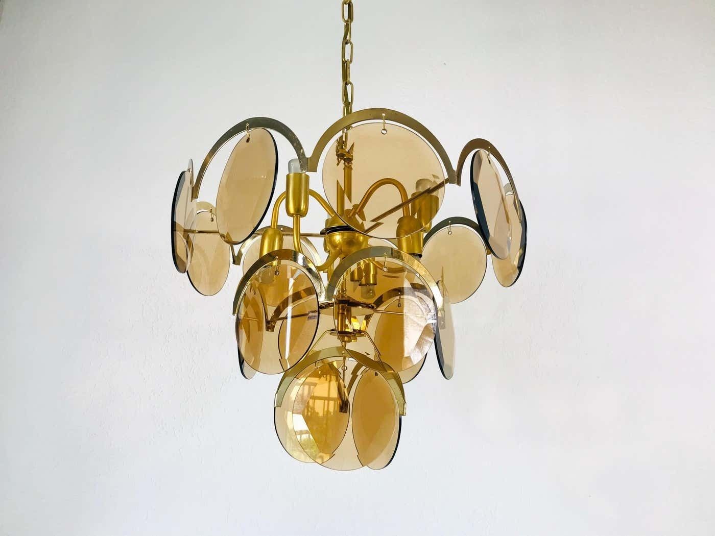 Midcentury Three Tier Brass And Glass Chandelier By Vistosi, 1960s photo vinterior