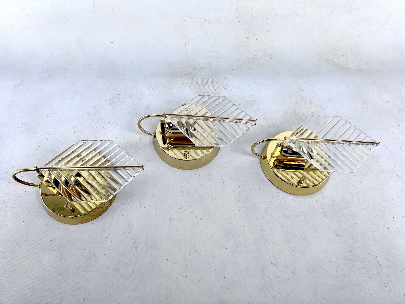 Vintage Set Of Three Sconces In Brass And Glass By Zero Quattro. Italy 1970s photo vinterior