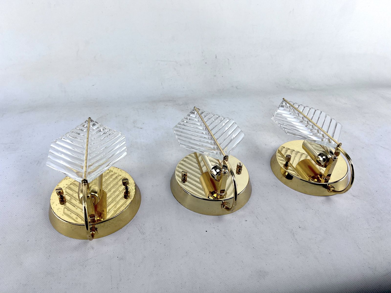 Lighting Vintage Set Of Three Sconces In Brass And Glass By Zero Quattro. Italy 1970s photo