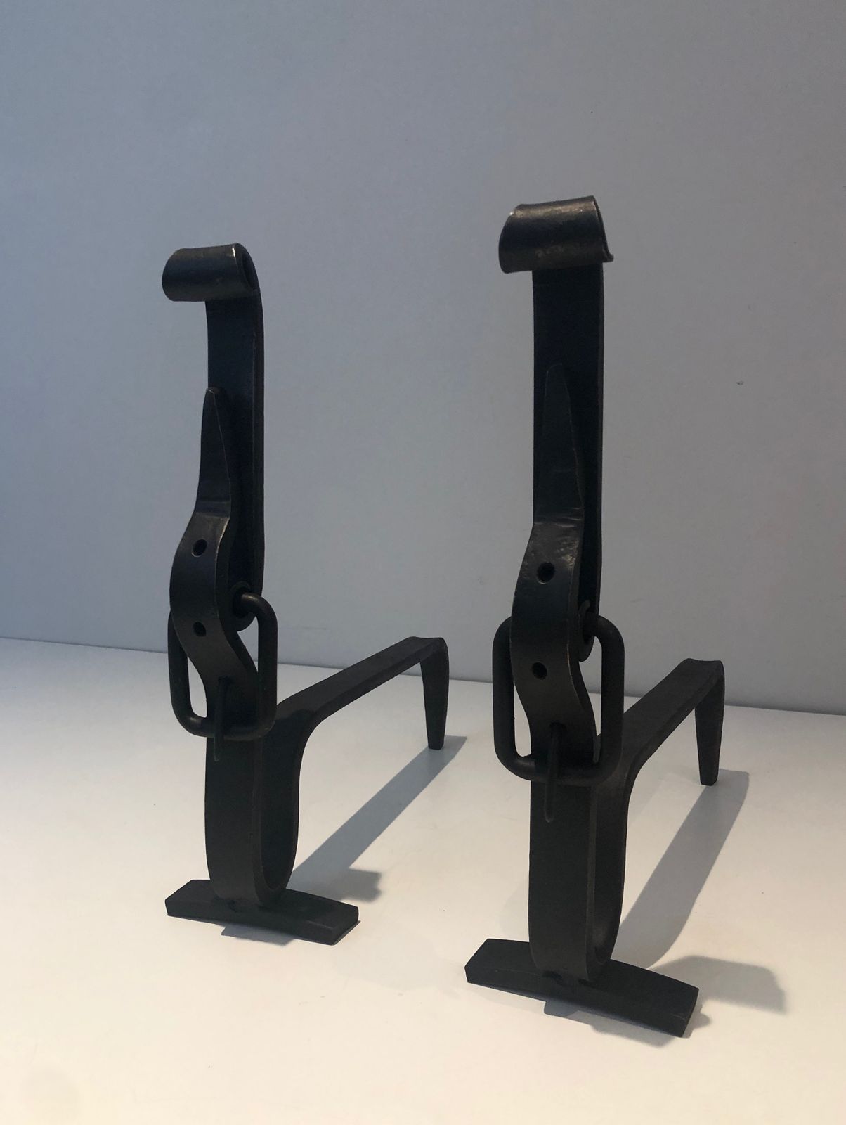 Pair Of Wrought Iron Belt Andirons photo for sale