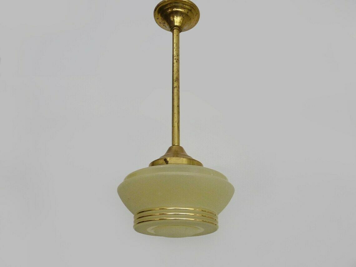 Suspension globe jaune granité, liseré doré, ancien abat-jour Art déco photo for sale