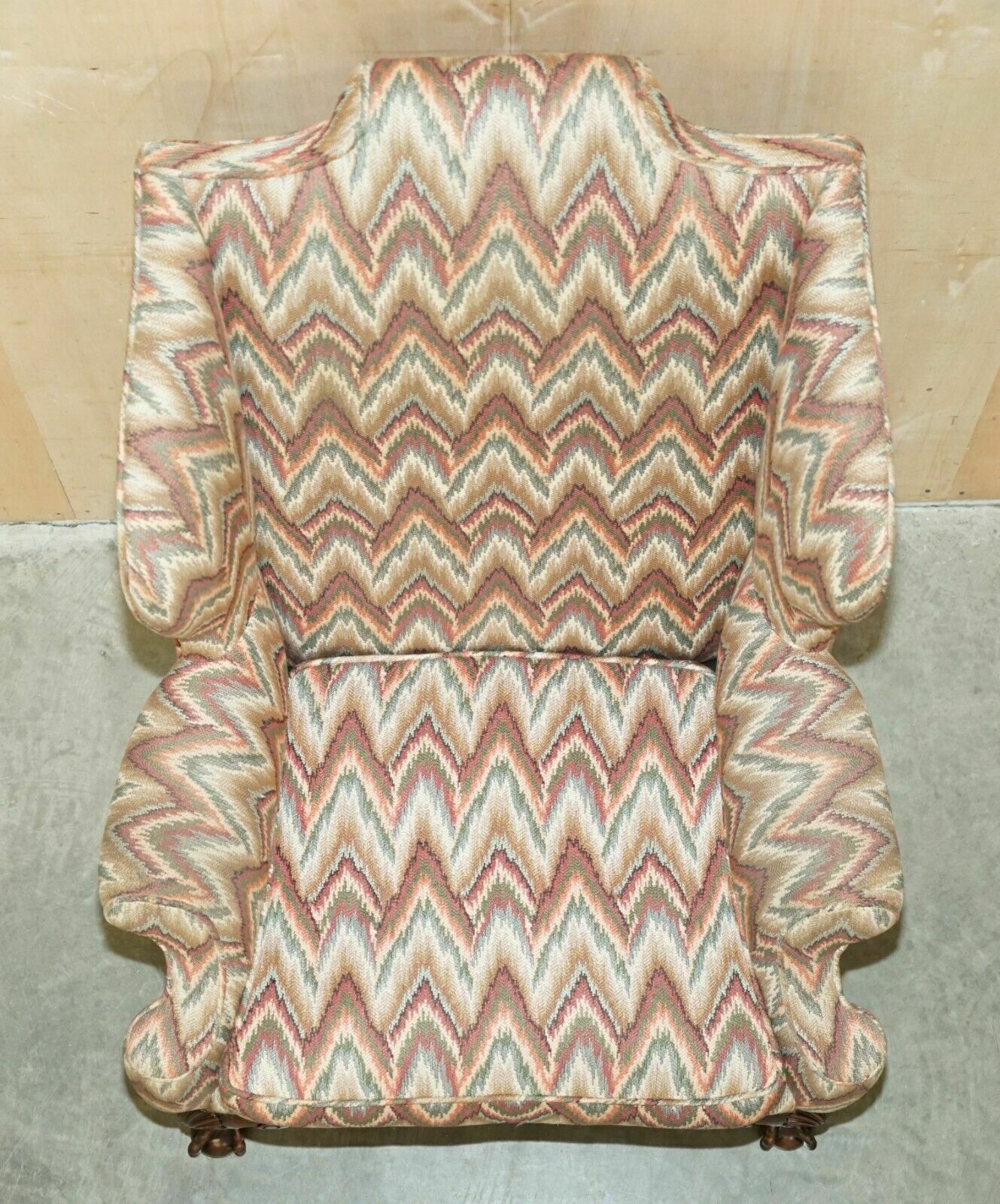 photo vintage Pair Of Antique Kilim Fabric Wingback Armchairs Ornately Carved Claw & Ball Feet