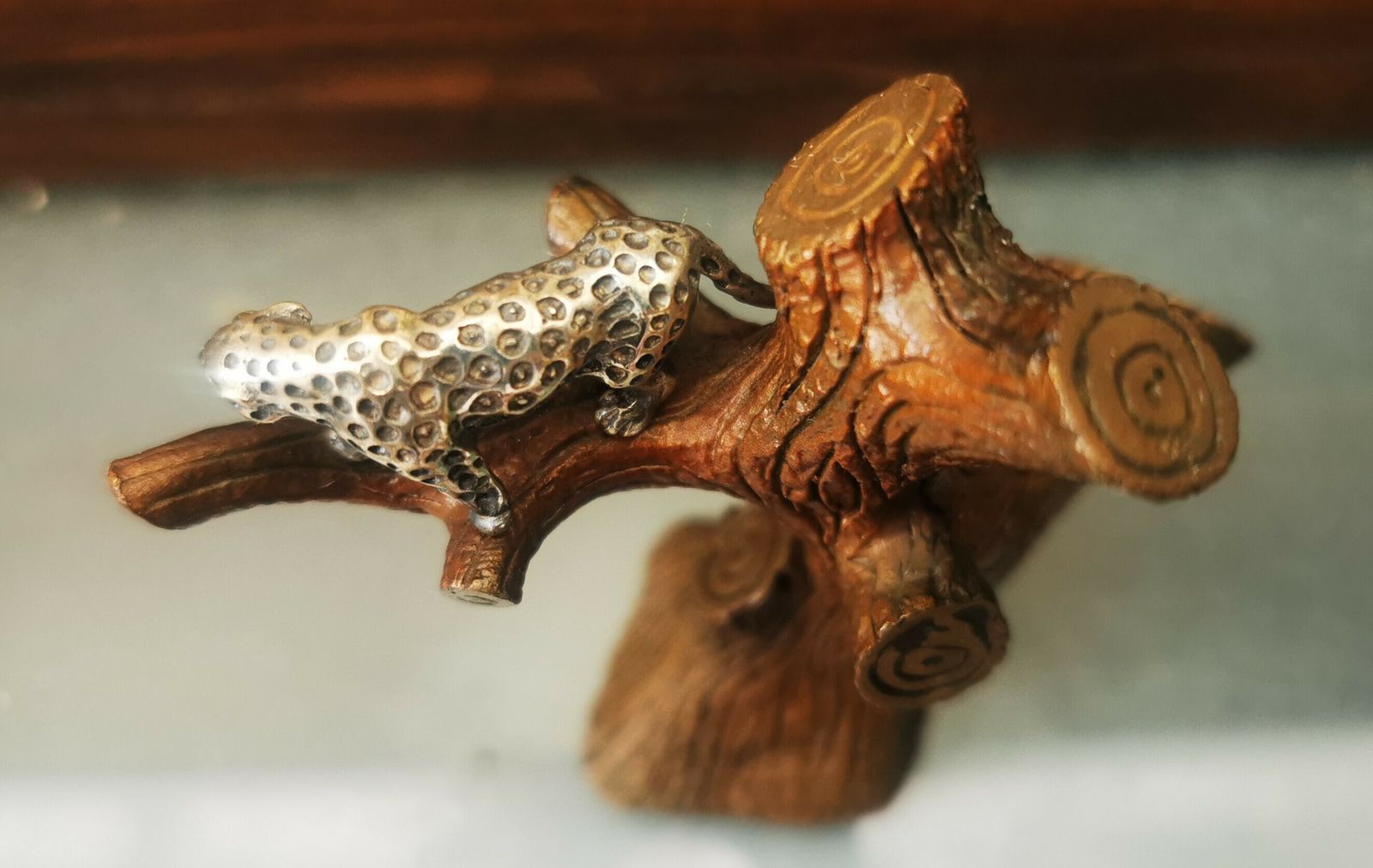 Miniature Metal Figurine Of Silver Leopard In Tree photo furniture