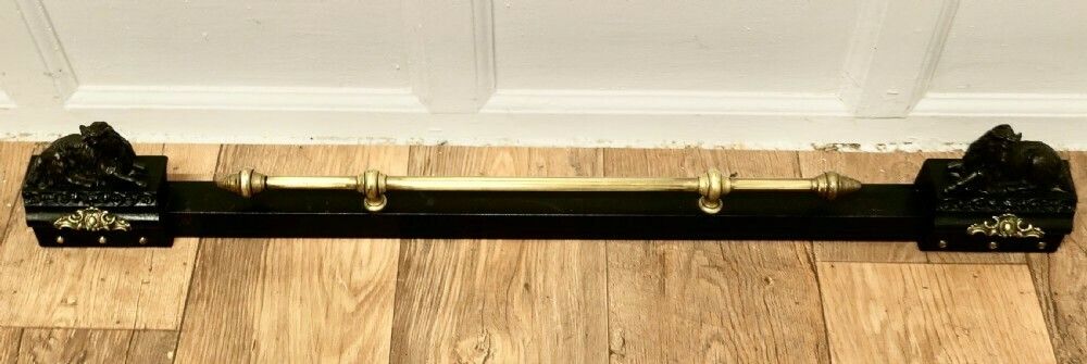 A Brass And Iron Country House Fender With Mountain Goats photo furniture