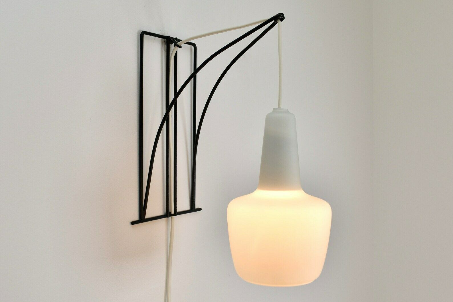photo furniture Modernist Wall Sconce Wire Metal Glass | Vintage Mid Century Modern Lamp Light Satined Milk Glass Black | Philips Louis Kalff Dutch Design